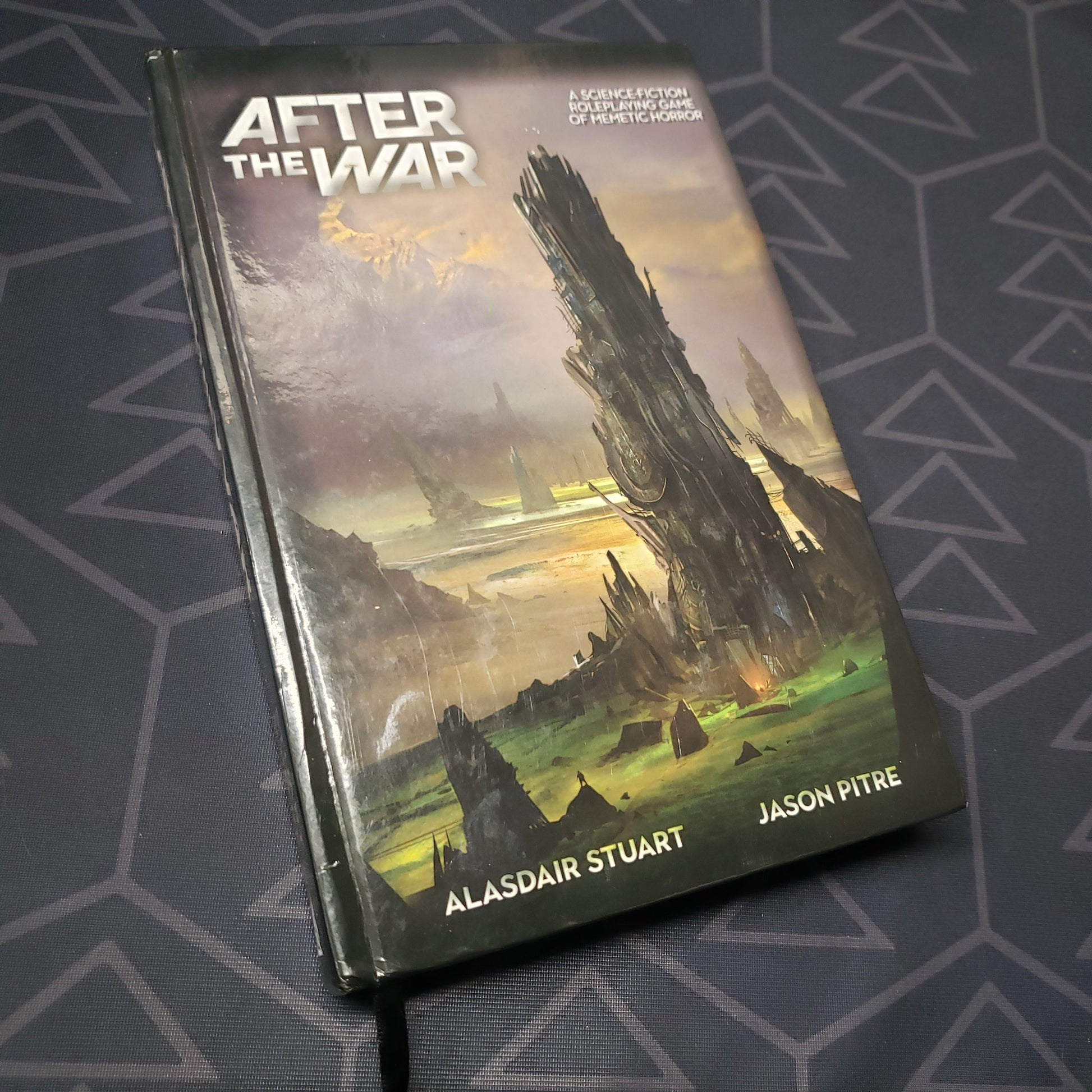 Image shows the front cover of the core rulebook for the roleplaying game After the War