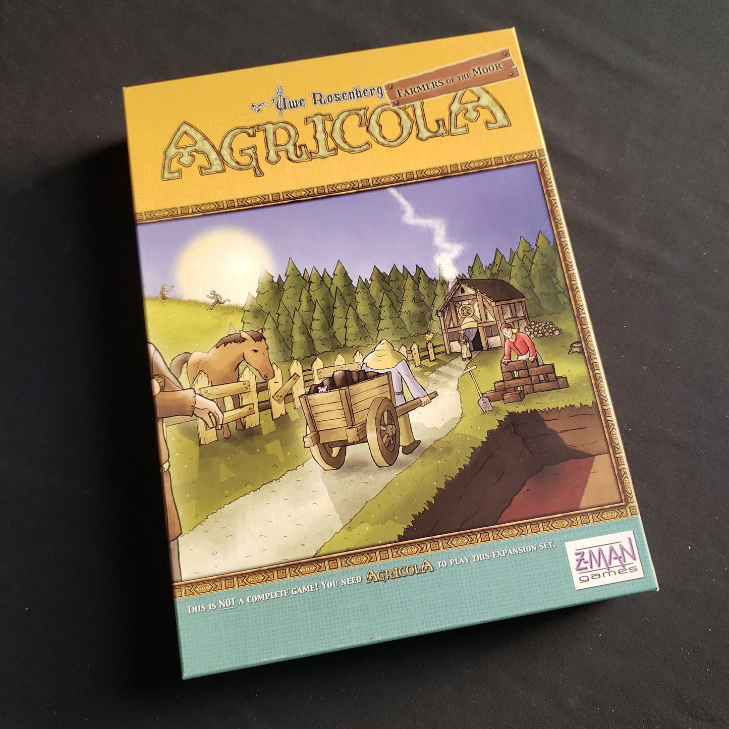 Image shows the front of the box for the Farmers of the Moor Expansion for the Agricola board game