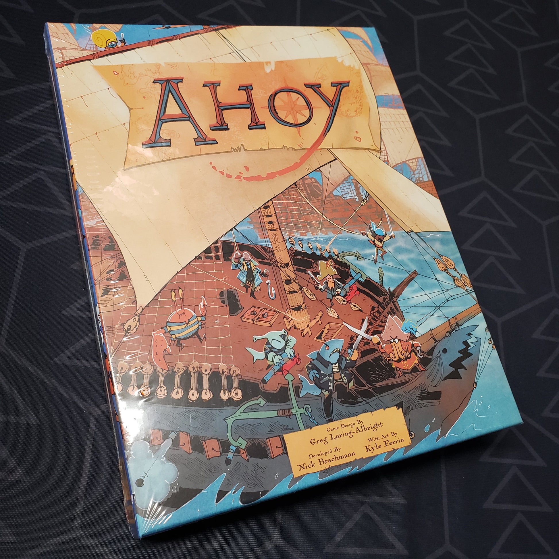 Image shows the front cover of the box of the Ahoy board game