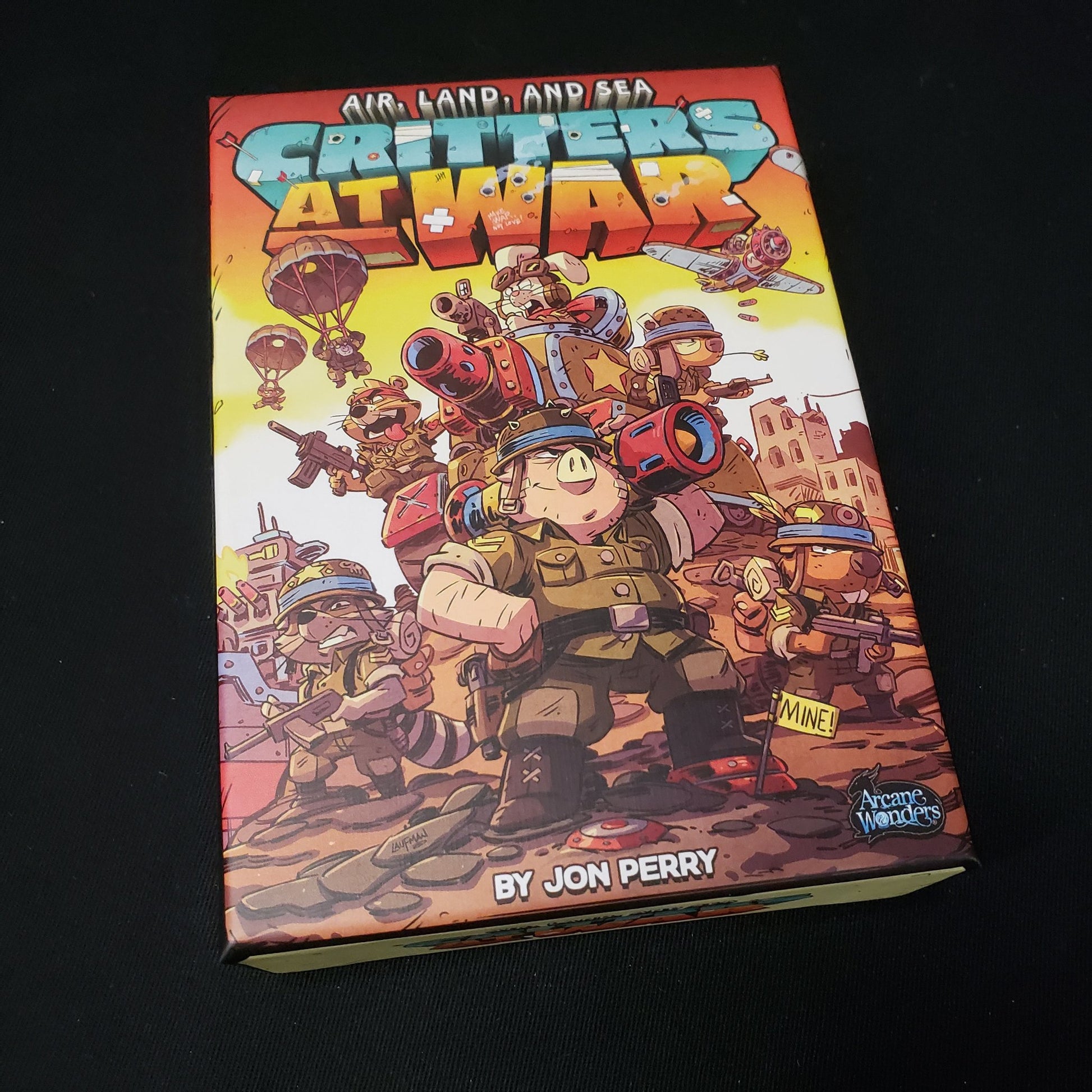 Image shows the front cover of the box of the Air, Land & Sea: Critters At War card game