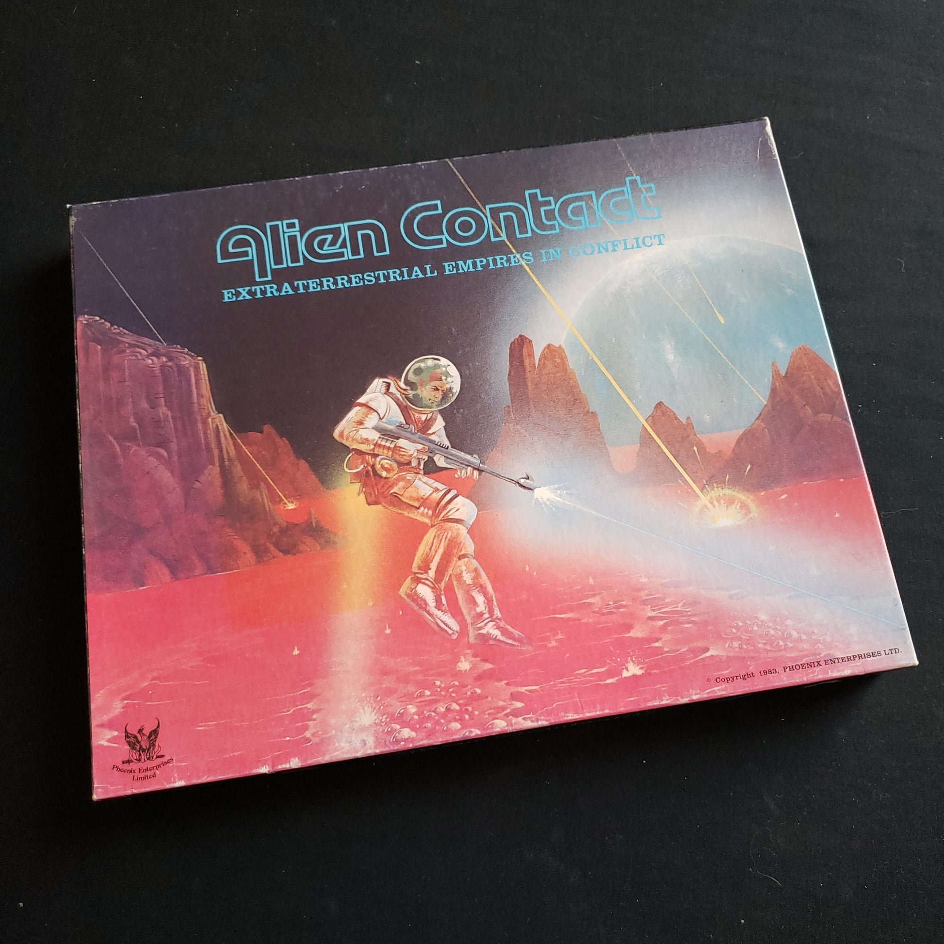 Image shows the front cover of the box of the Alien Contact board game