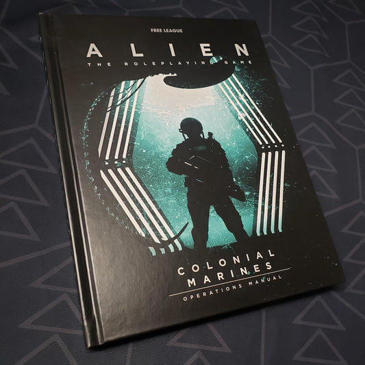 Image shows the front cover of the Colonial Marines Operations Manual book for the roleplaying game ALIEN