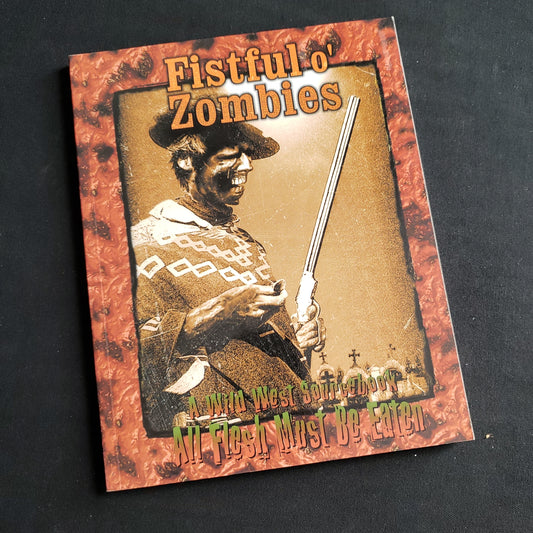 Image shows the front cover of the Fistful O' Zombies book for the All Flesh Must Be Eaten roleplaying game