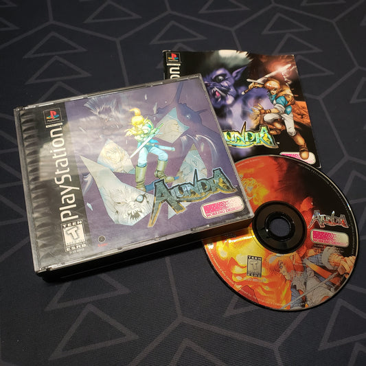 Image shows the jewel casee, manual and disc for the video game Alundra for Playstation 1