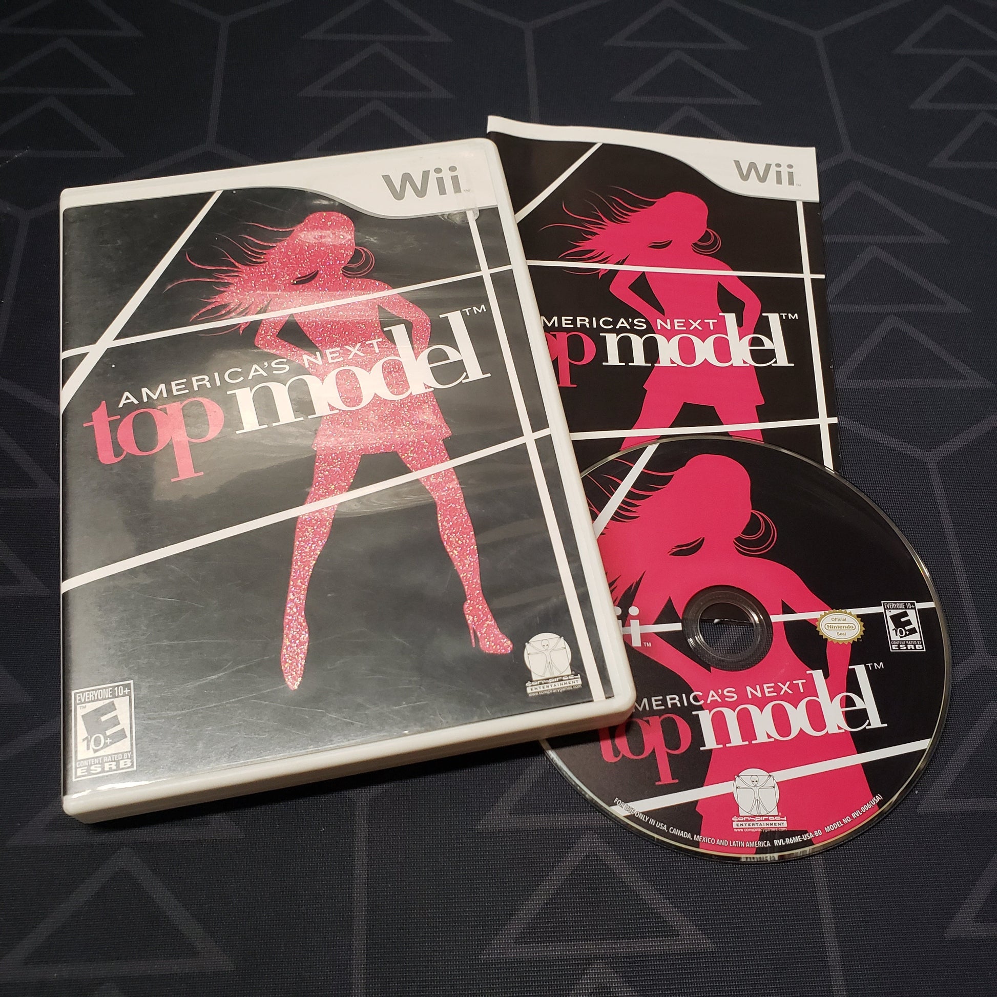 Image shows the case, manual and disc for the video game America's Next Top Model for Nintendo Wii