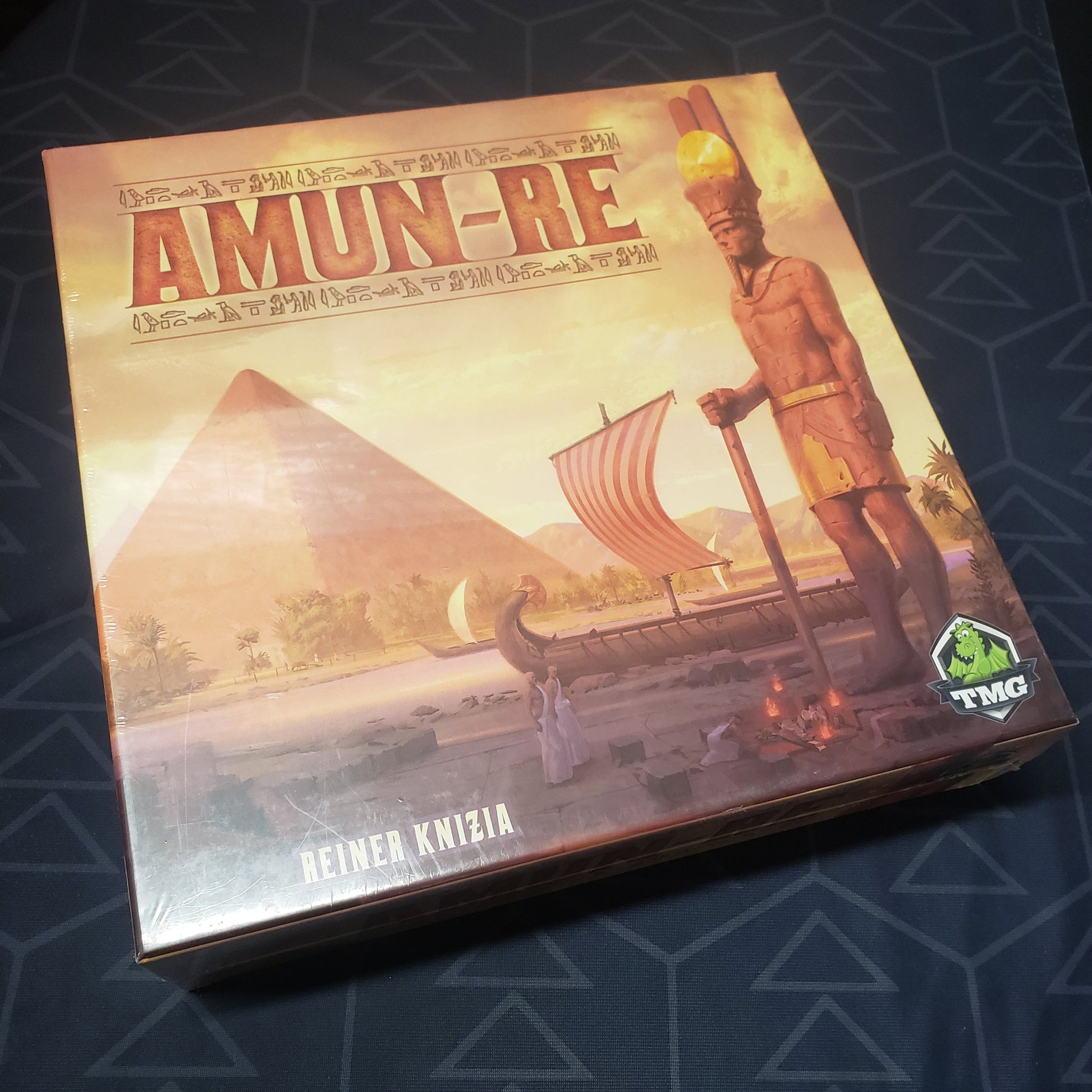 Image shows the front cover of the box for the Amun-Re board game