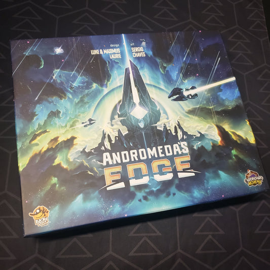 Image shows the front cover of the box for the Andromeda's Edge board game