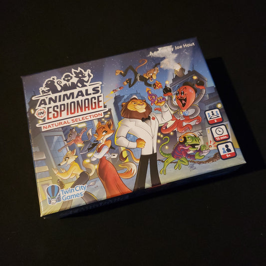 Image shows the front cover of the box of the Animals in Espionage card game