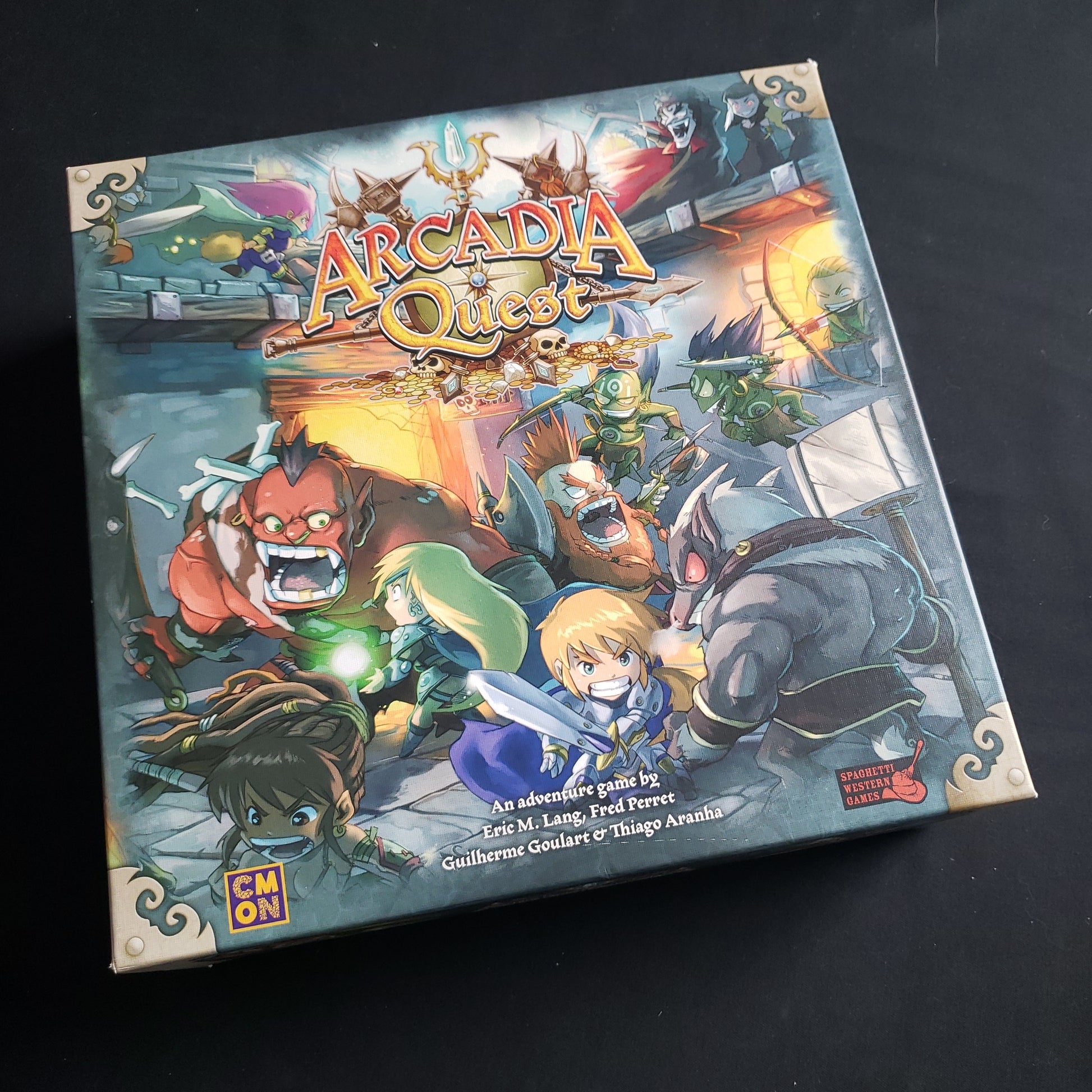 Image shows the front cover of the box of the Arcadia Quest board game