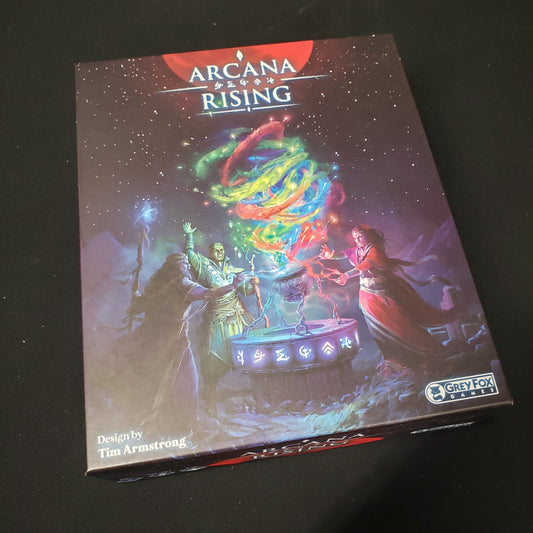Image shows the front cover of the box of the Arcana Rising board game