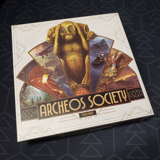 Image shows the front cover of the box for the Archeos Society board game