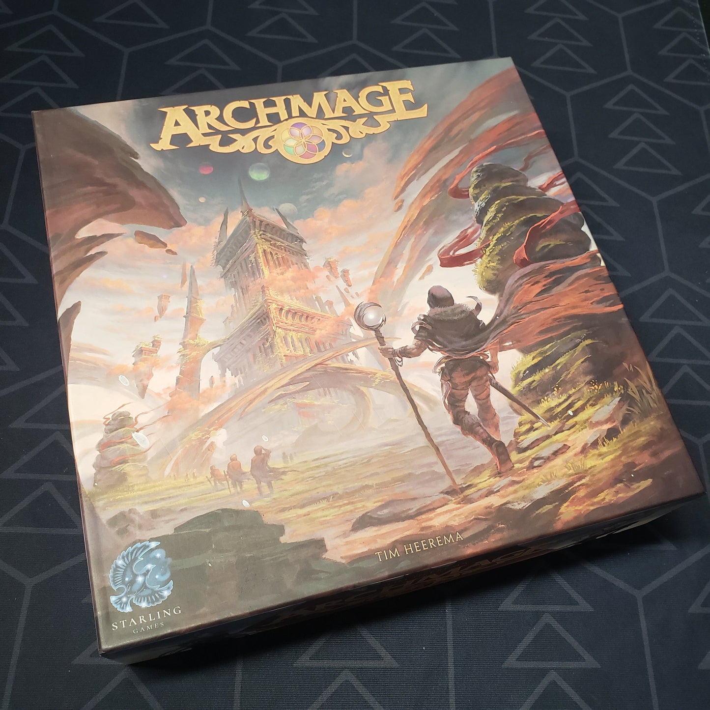 Image shows the front cover of the box for the Archmage board game