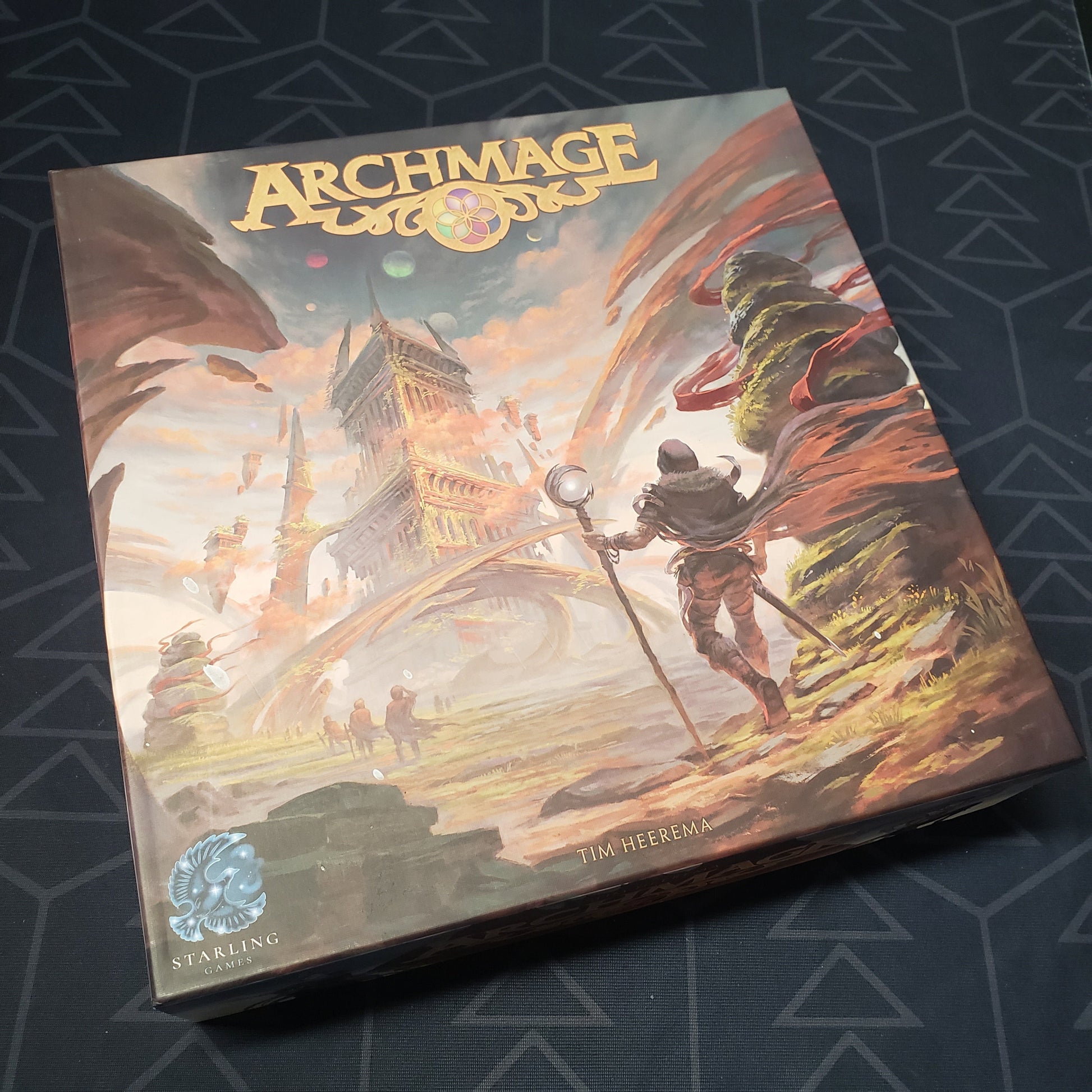 Image shows the front cover of the box for the Archmage board game