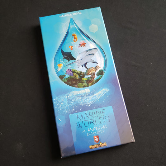 Image shows the front cover of the box of the Marine Worlds expansion for the board game Ark Nova