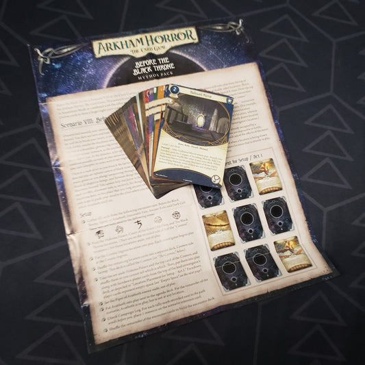 Image shows the cards & instruction sheet for the Before the Black Throne Mythos pack for the card game Arkham Horror
