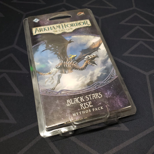 Image shows the front of the package for the Black Stars Rise Mythos Pack expansion for Arkham Horror: The Card Game
