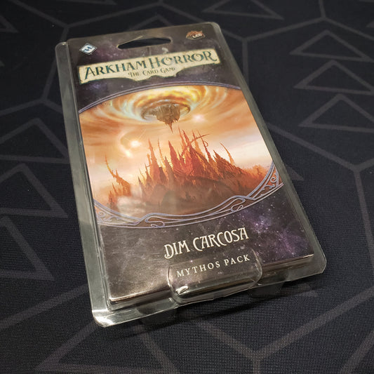 Image shows the front of the package for the Dim Carcosa Mythos Pack expansion for Arkham Horror: The Card Game
