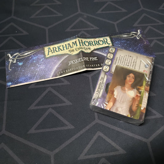 Image shows the shrinkwrapped cards & instructions for the Jacqueline Fine Investigator Starter Deck from the Arkham Horror Card Game