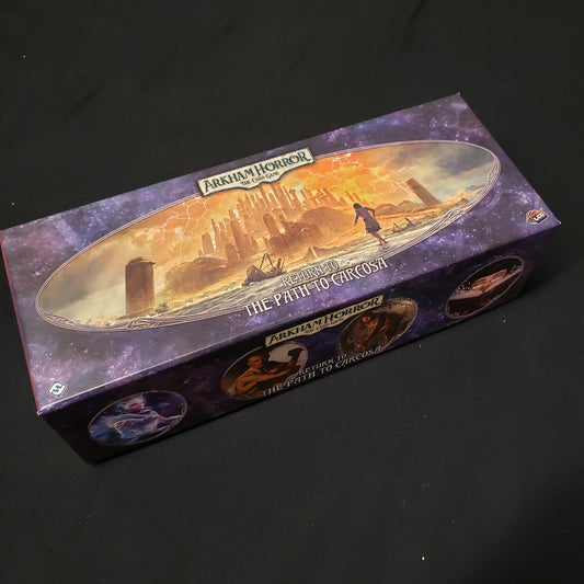Image shows the front cover of the box of the Return to the Path to Carcosa expansion for the Arkham Horror card game