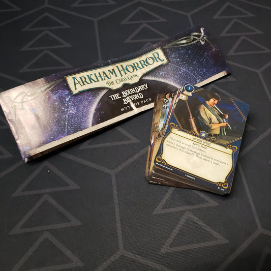 Image shows the instructions & cards for the Boundary Beyond Mythos Pack expansion for Arkham Horror: The Card Game