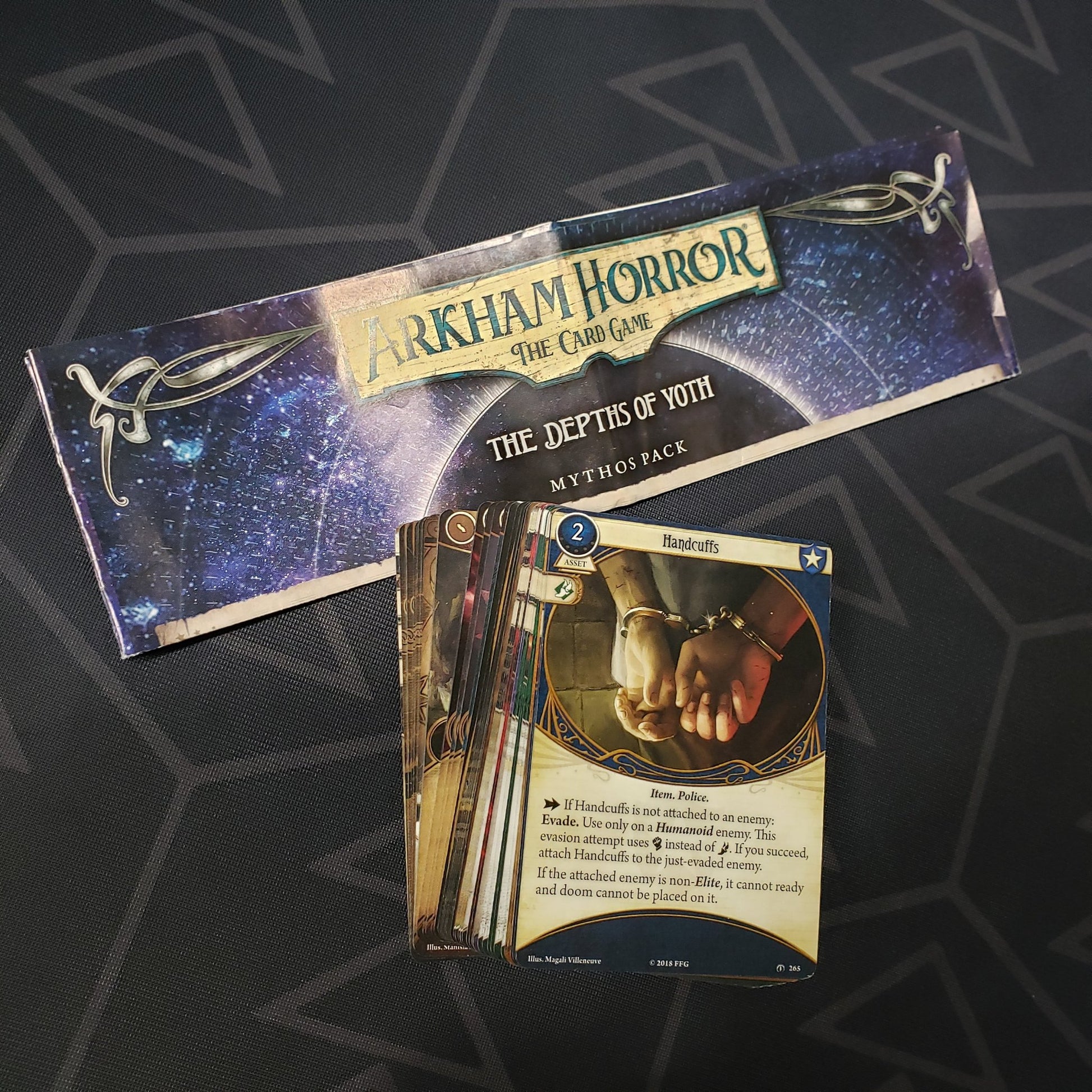 Image shows the cards & instructions for the Depths of Yoth Mythos Pack expansion for Arkham Horror: The Card Game