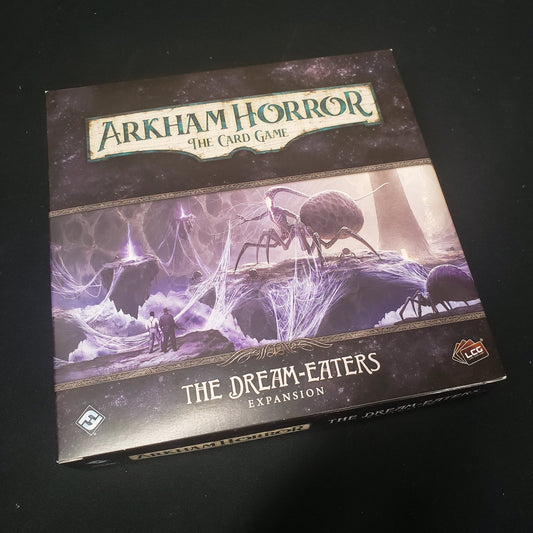 Image shows the front cover of the box for the Dream-Eaters Deluxe expansion from the Arkham Horror Card Game