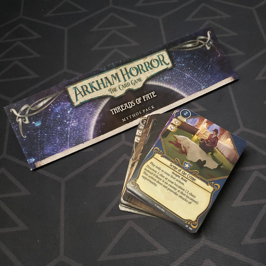 Image shows the instructions & cards for the Threads of Fate Mythos Pack expansion for Arkham Horror: The Card Game