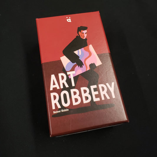 Image shows the front cover of the box of the Art Robbery card game