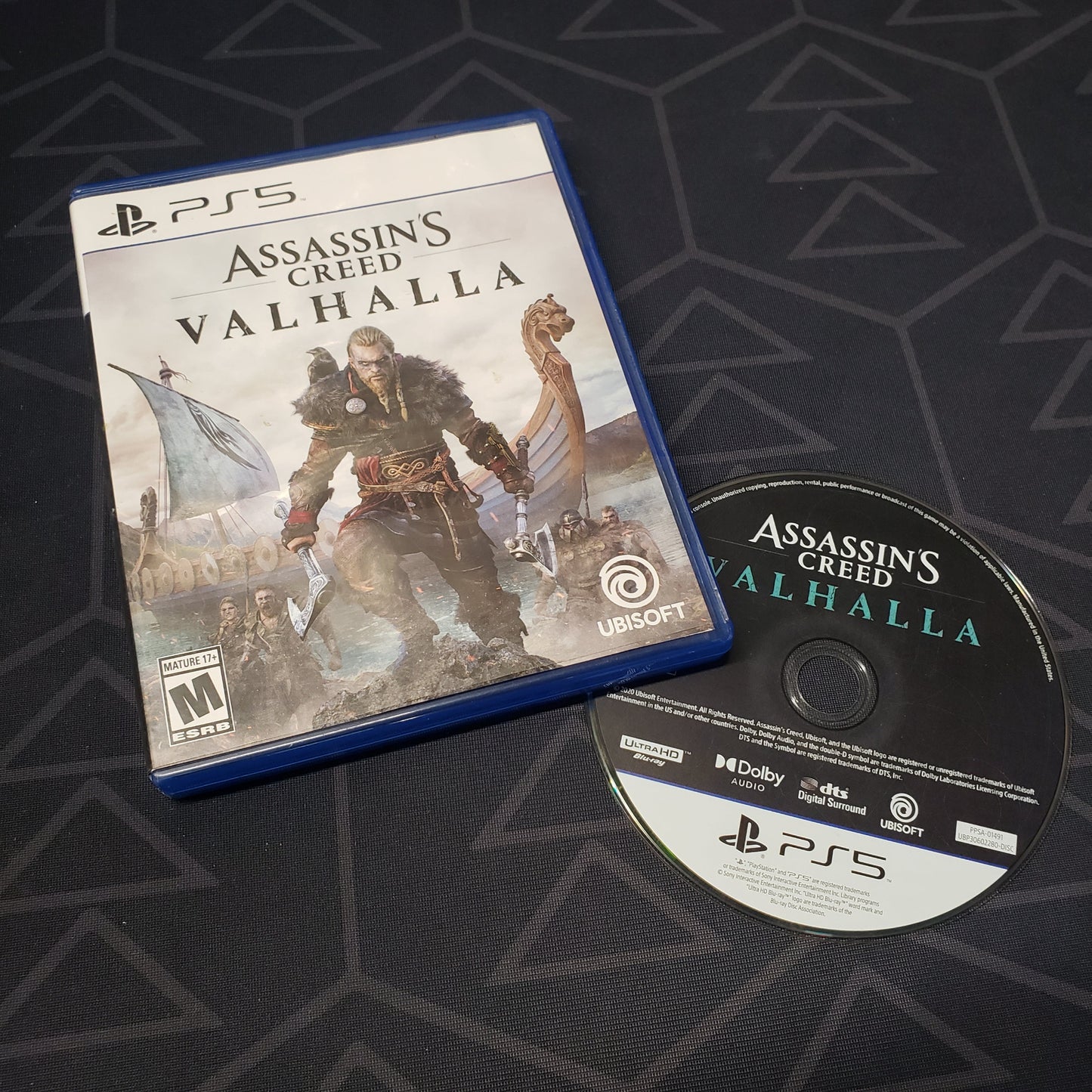 Image shows the case and disc for the video game Assassin's Creed: Valhalla for Playstation 5