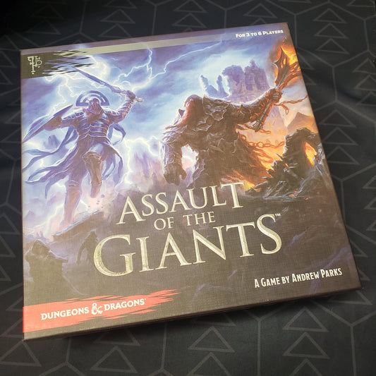 Image shows the front cover of the box of the Assault of the Giants board game
