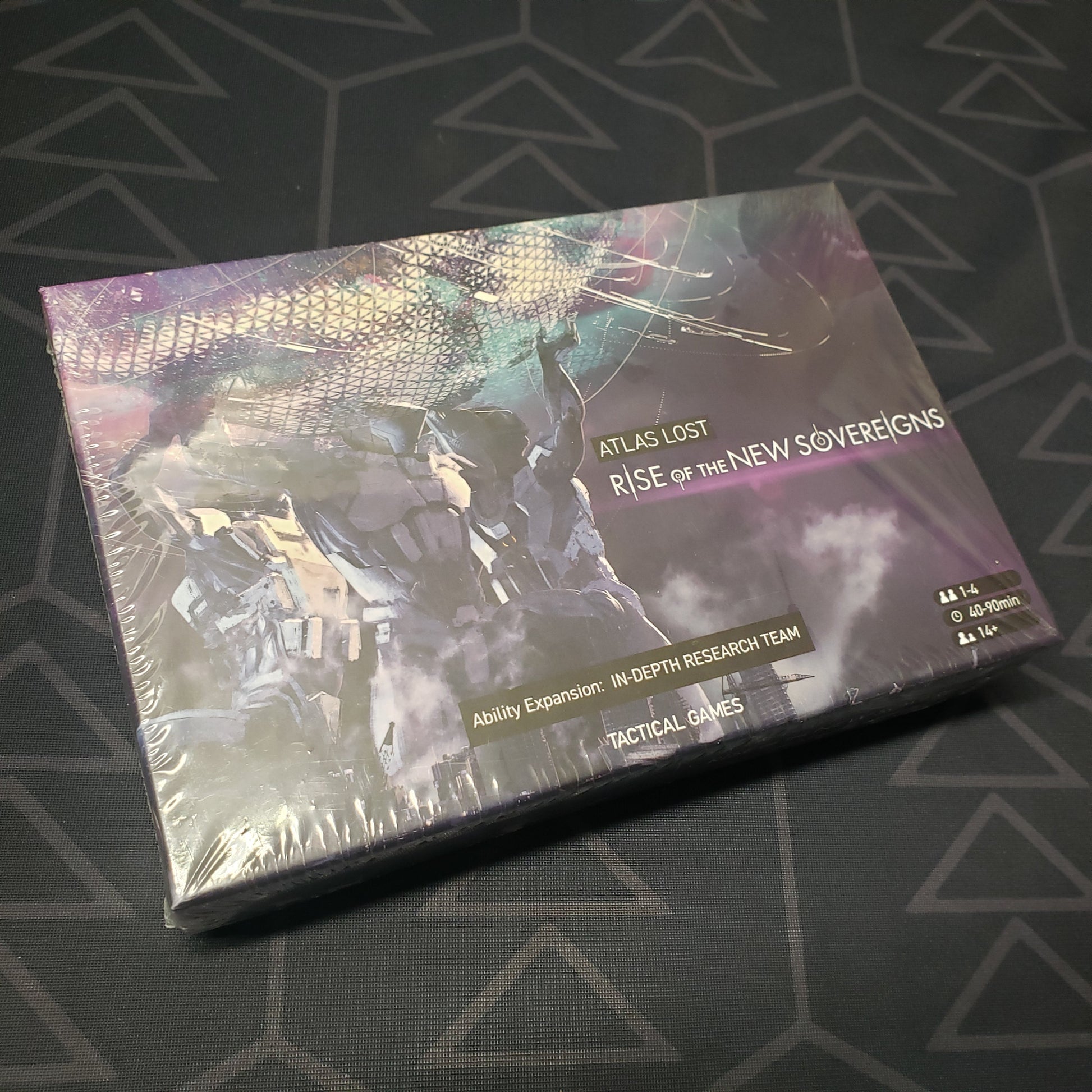 Image shows the front cover of the box of the In-Depth Research Team Ability expansion for the board game Atlas Lost: Rise of the New Sovereigns
