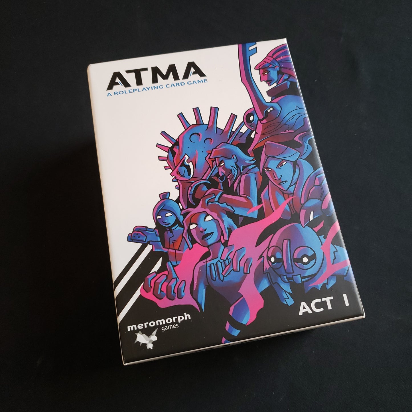 Image shows the front cover of the box of the Atma RPG card game