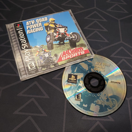 Image shows the jewel case with manual and disc for the video game ATV: Quad Power Racing for Playstation 1