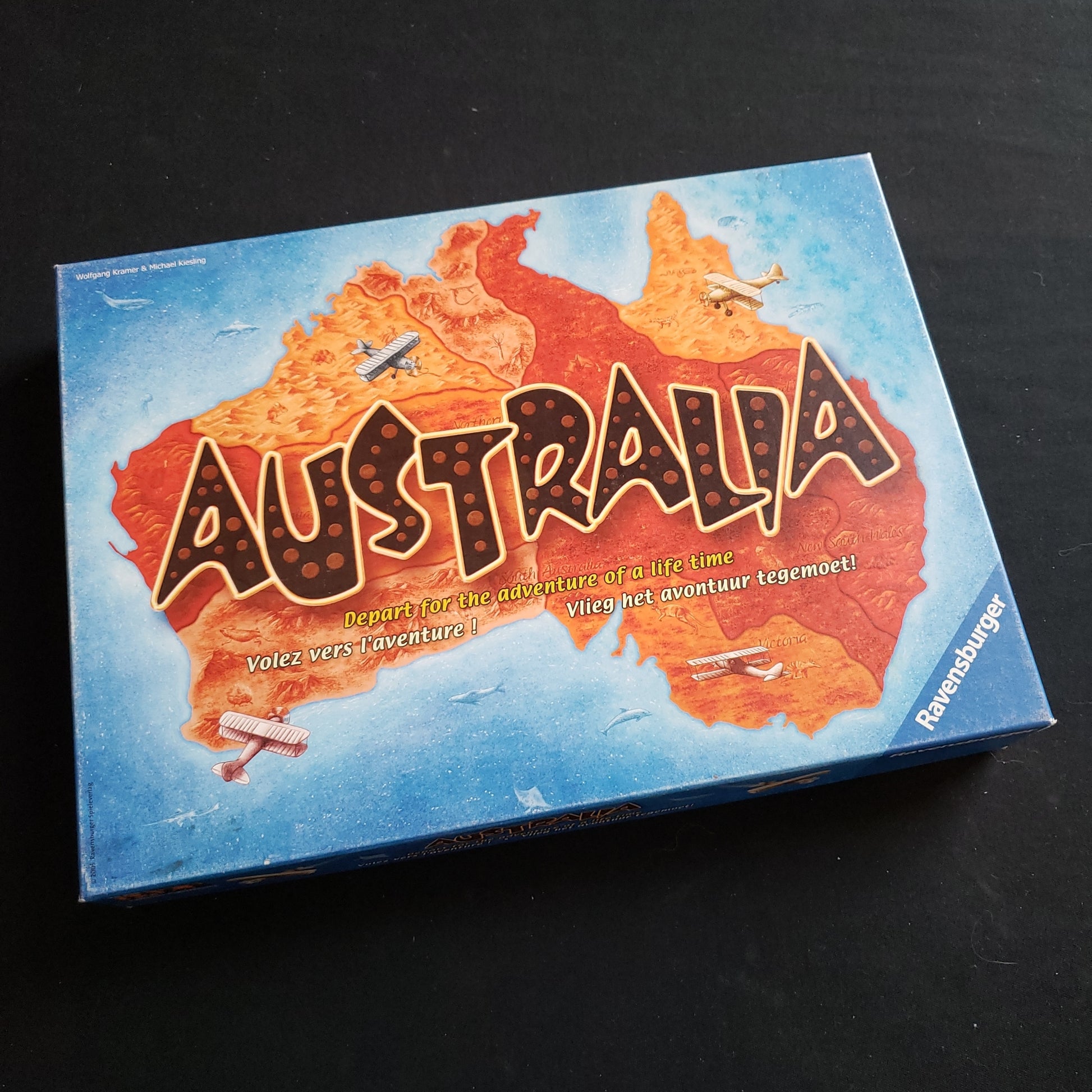 Image shows the front cover of the box of the Australia board game