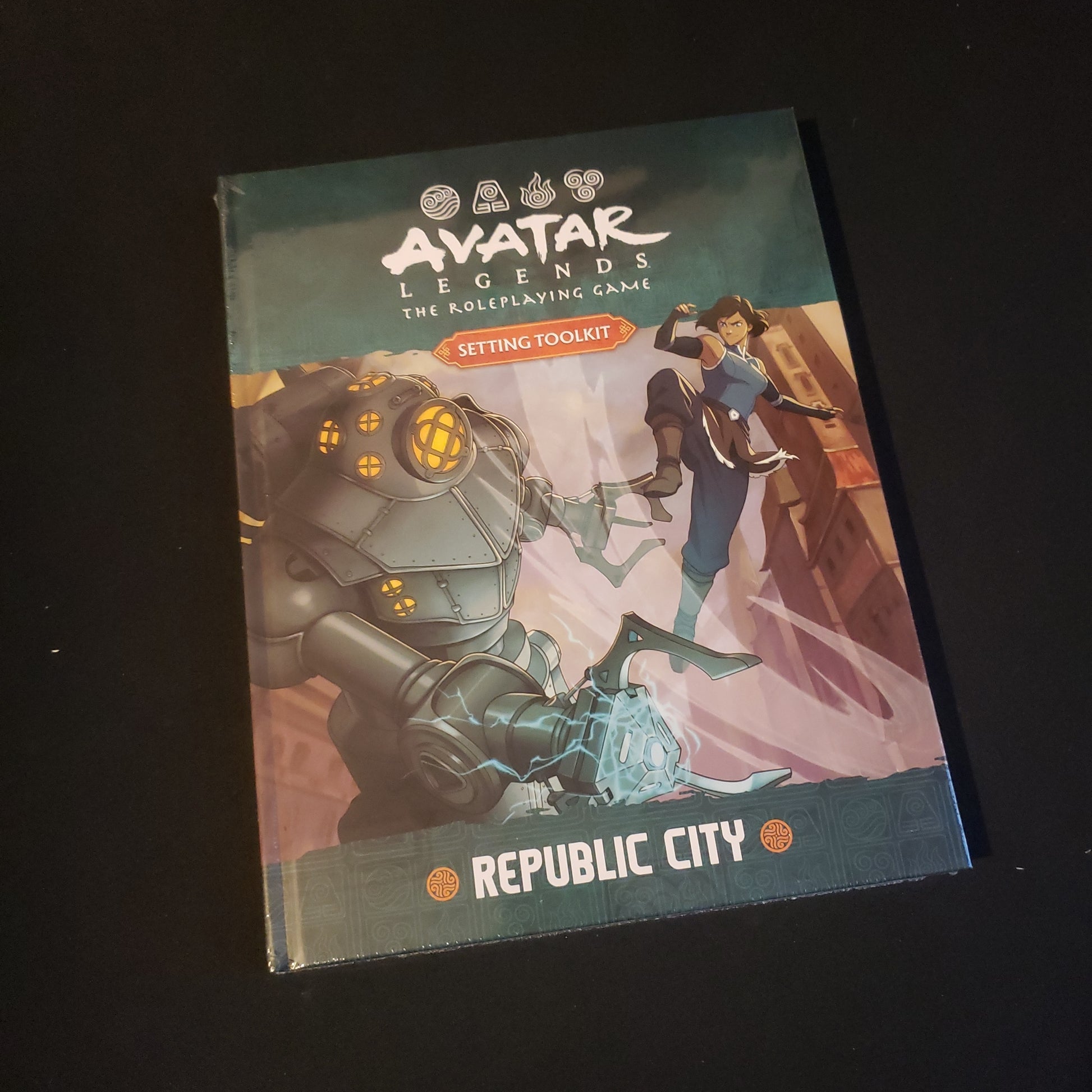 Image shows the front cover of the Republic City book for the Avatar Legends roleplaying game