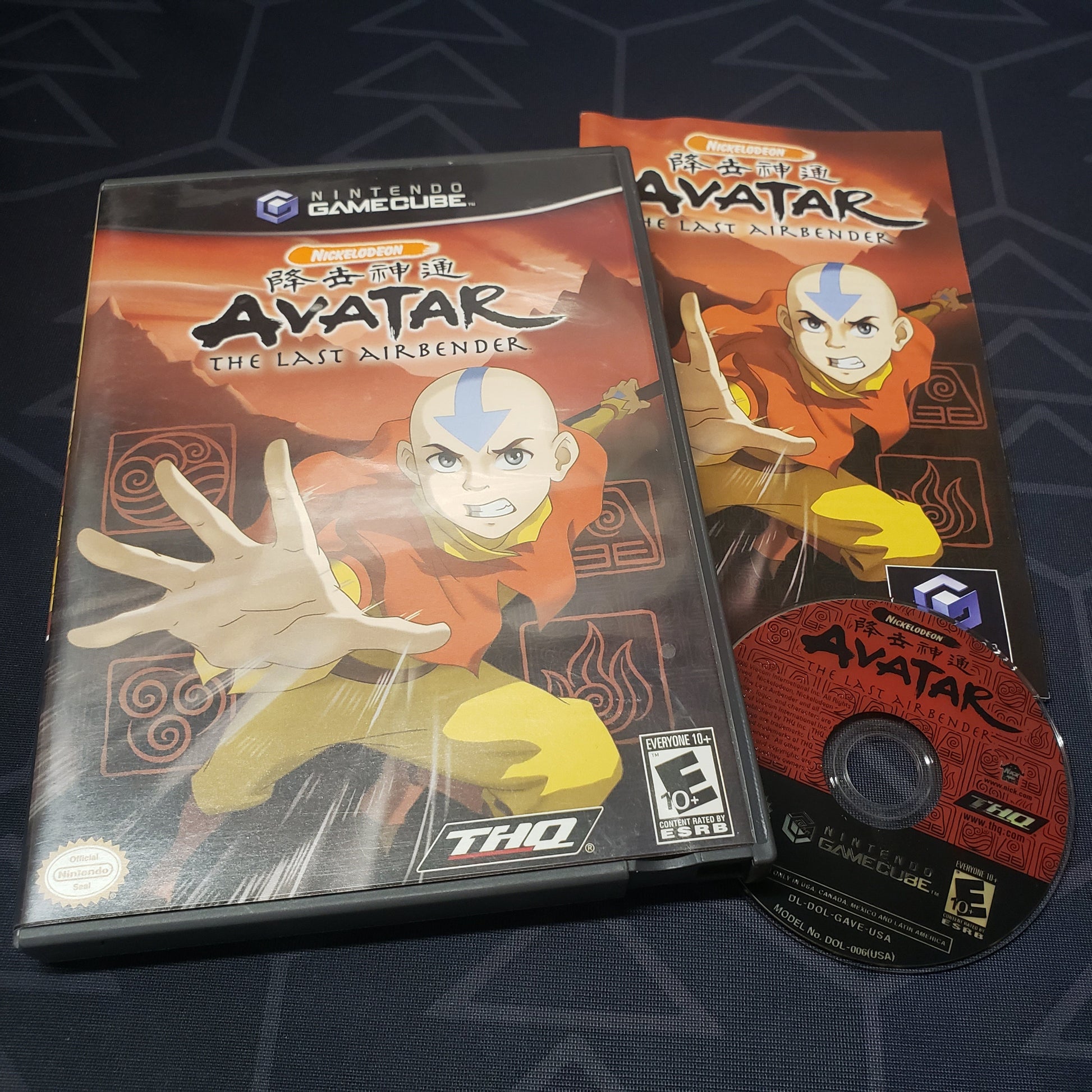 Image shows the case, manual and disc for the video game Avatar: The Last Airbender for Nintendo GameCube