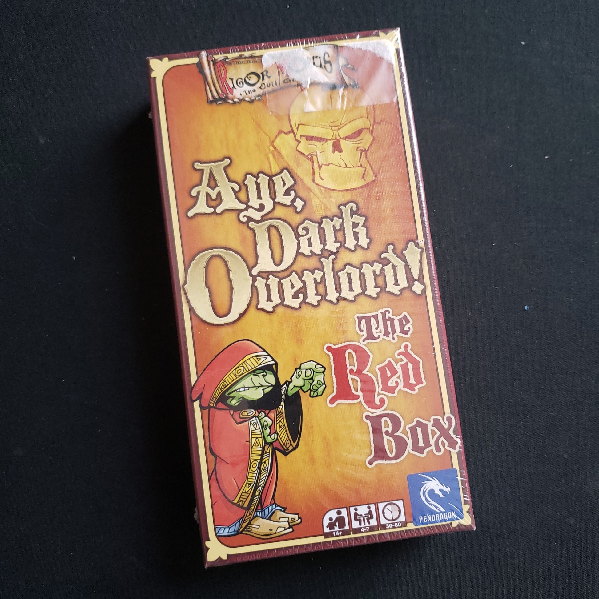 Image shows the front cover of the box of the Aye, Dark Overlord!: The Red box card game