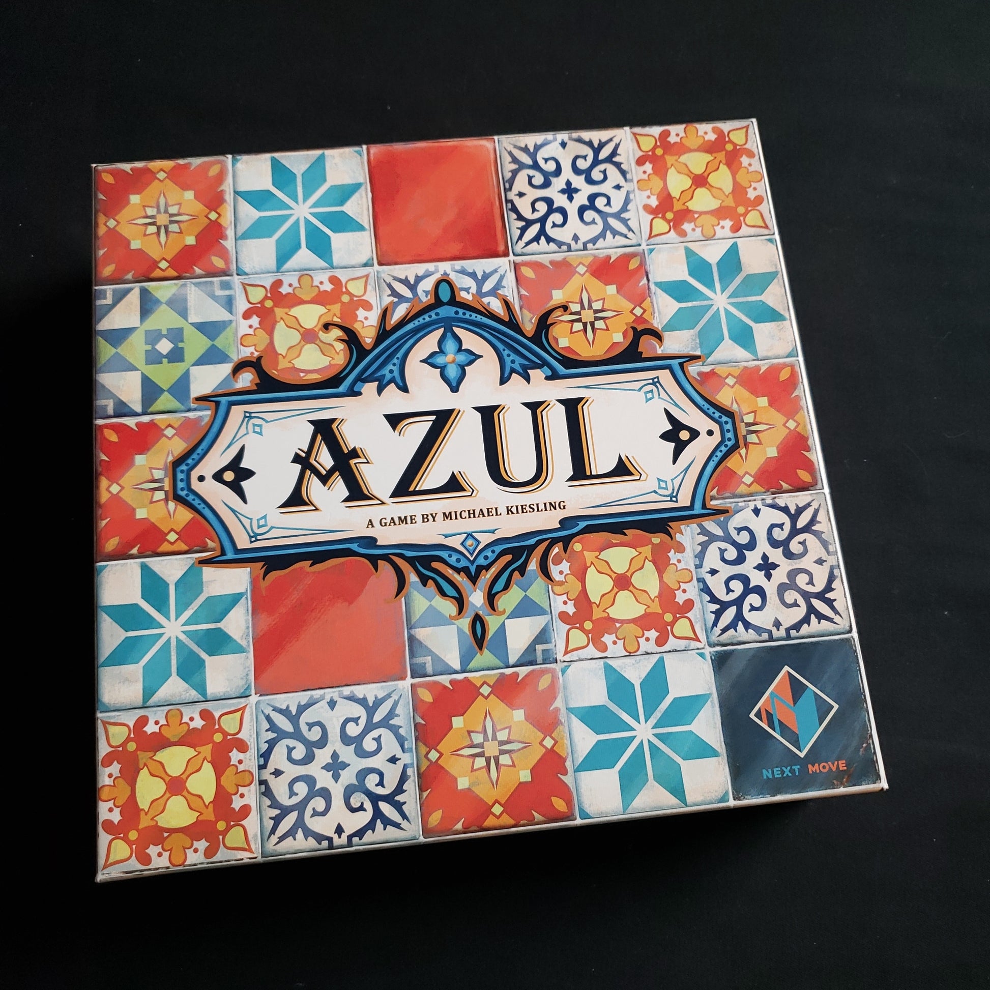 Image shows the front cover of the box of the Azul board game