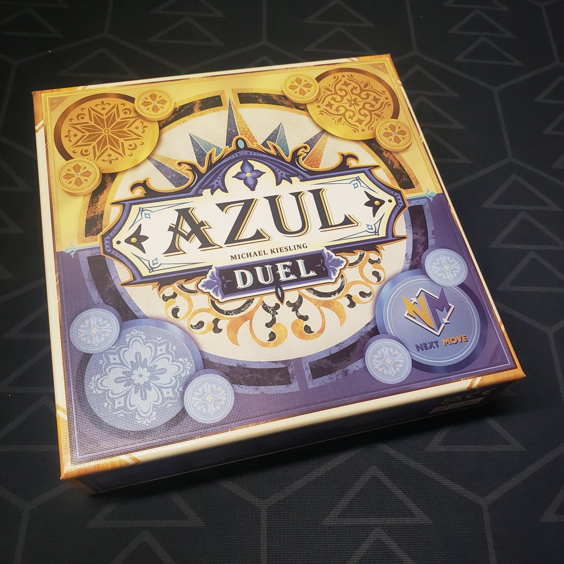 Image shows the front cover of the box for the Azul Duel board game