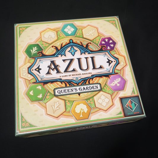 Image shows the front cover of the box of the Azul: Queen's Garden board game