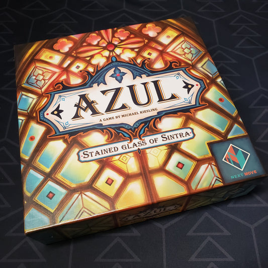 Image shows the front cover of the box for the Azul: Stained Glass of Sintra board game