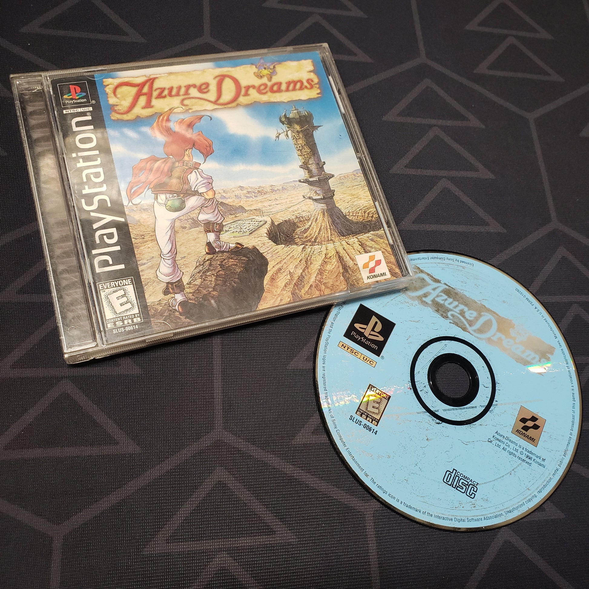 Image shows the jewel case with manual and disc for the video game Azure Dreams for Playstation 1