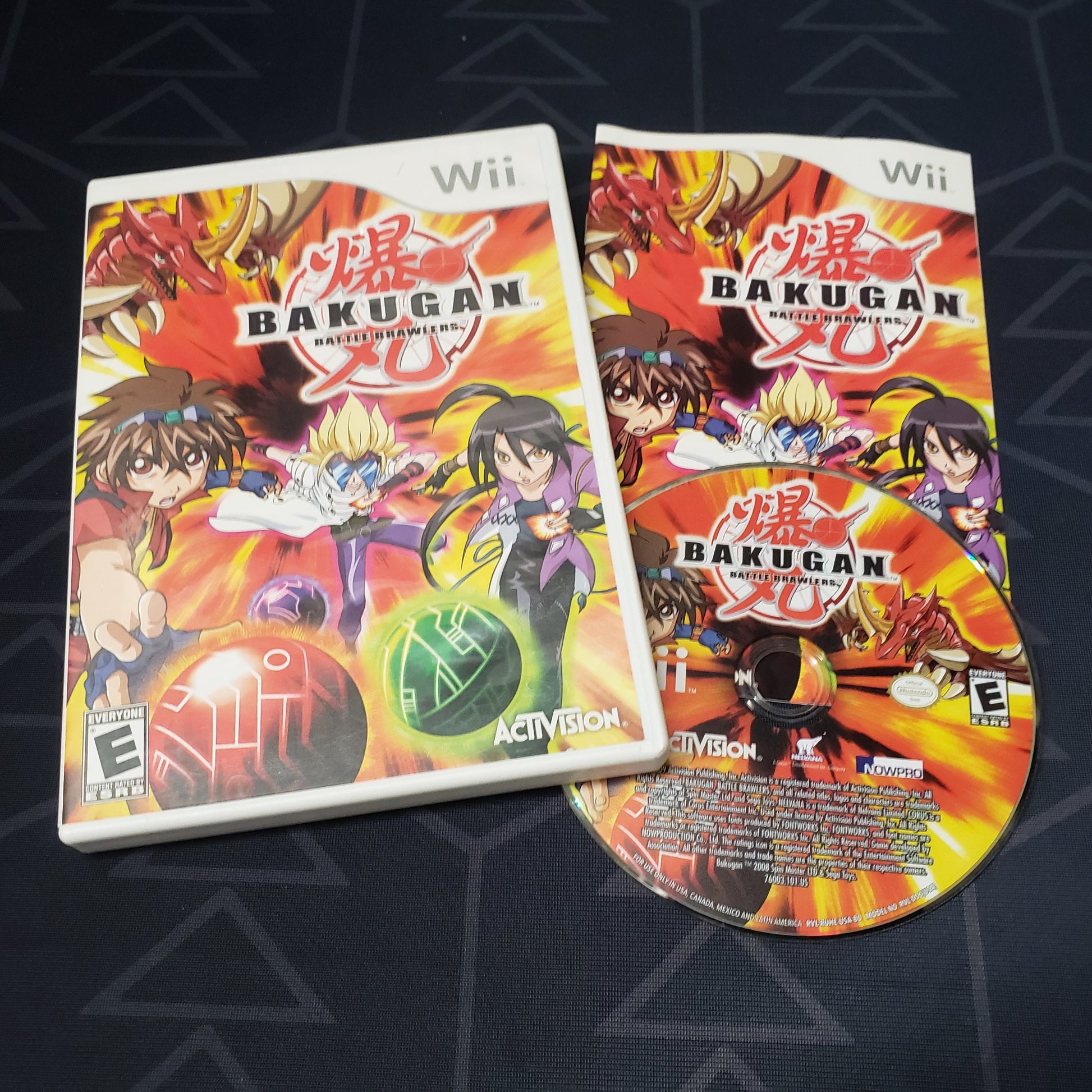 Image shows the case, manual & disc for the video game Bakugan Battle Brawlers for Nintendo Wii