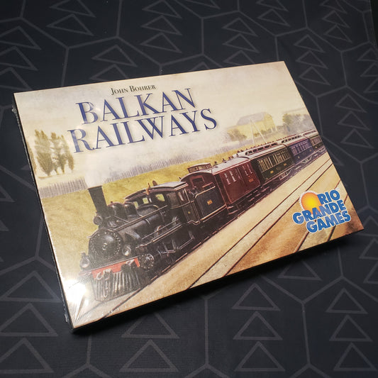 Image shows the front cover of the box for the Balkan Railways board game