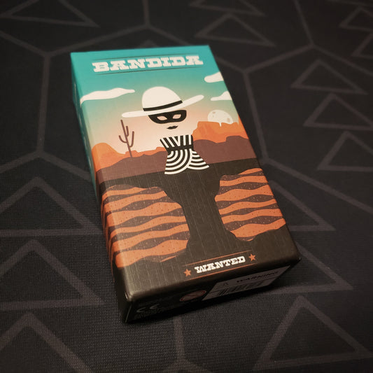Image shows the front cover of the box for the Bandida card game