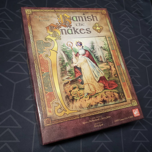 Image shows the front cover of the box for the Banish the Snakes board game