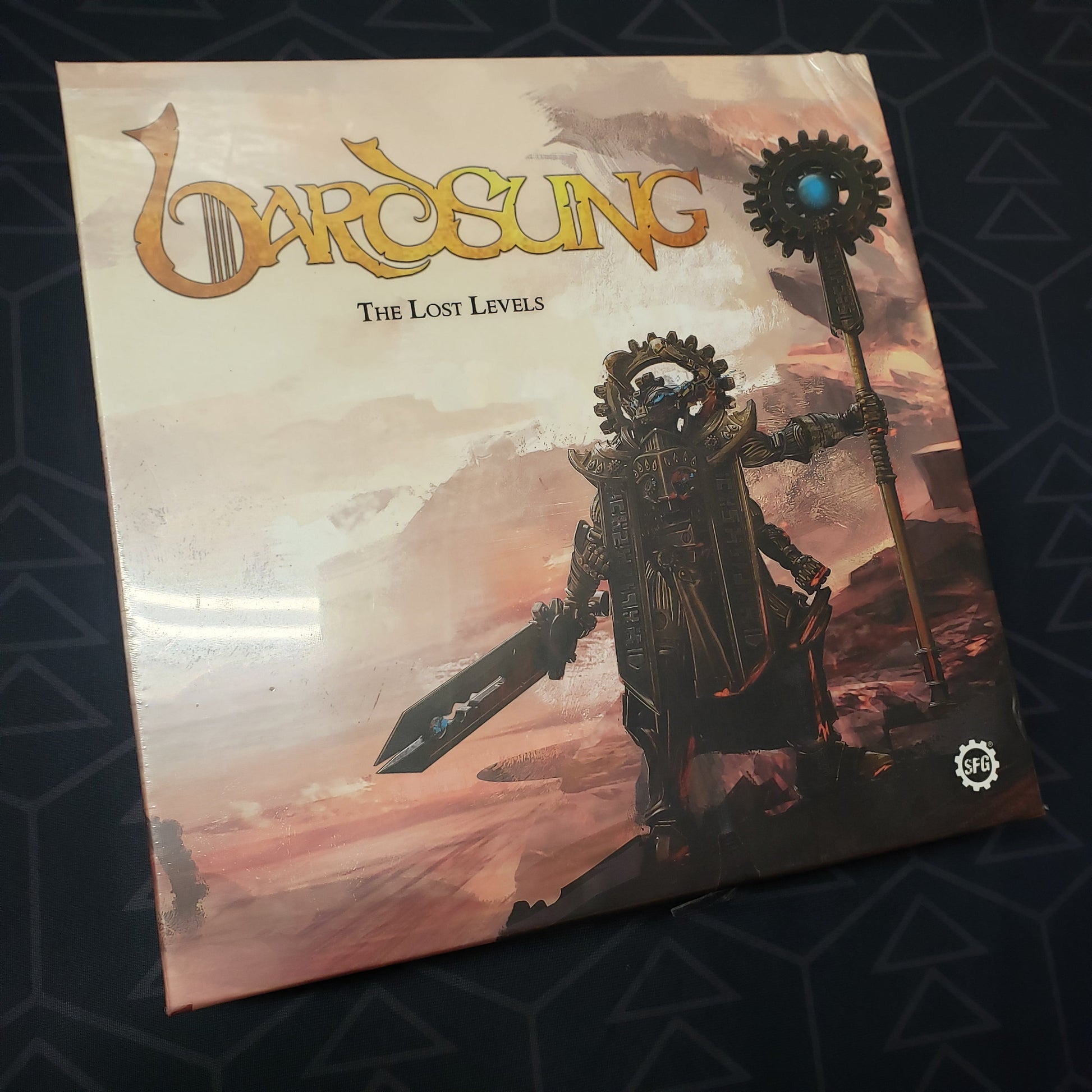 Image shows the front cover of the box of the Lost Levels expansion for the board game Bardsung