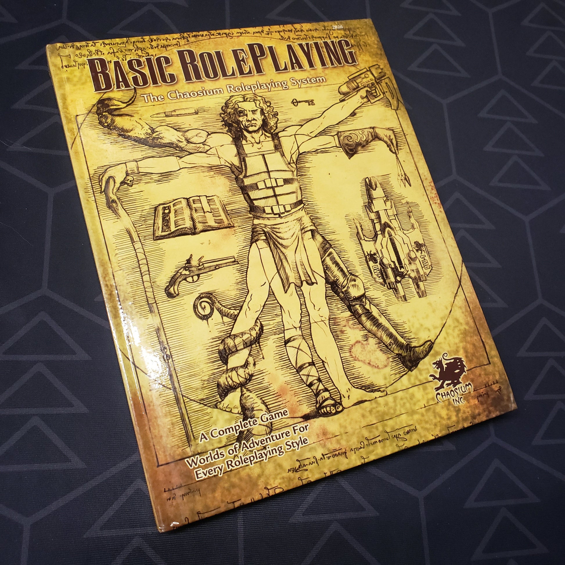 Image shows the front cover of the 2008 edition core rulebook for the roleplaying game Basic Roleplaying