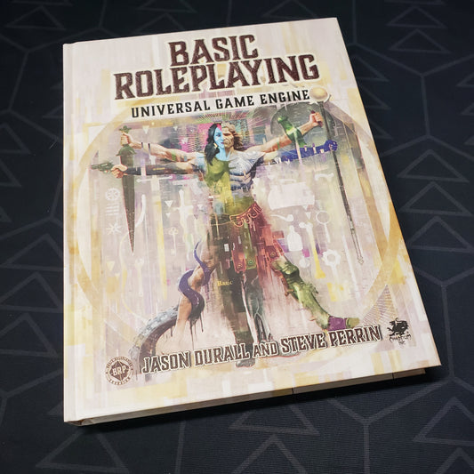 Image shows the front cover of the core rulebook for the Basic Roleplaying: Universal Game Engine