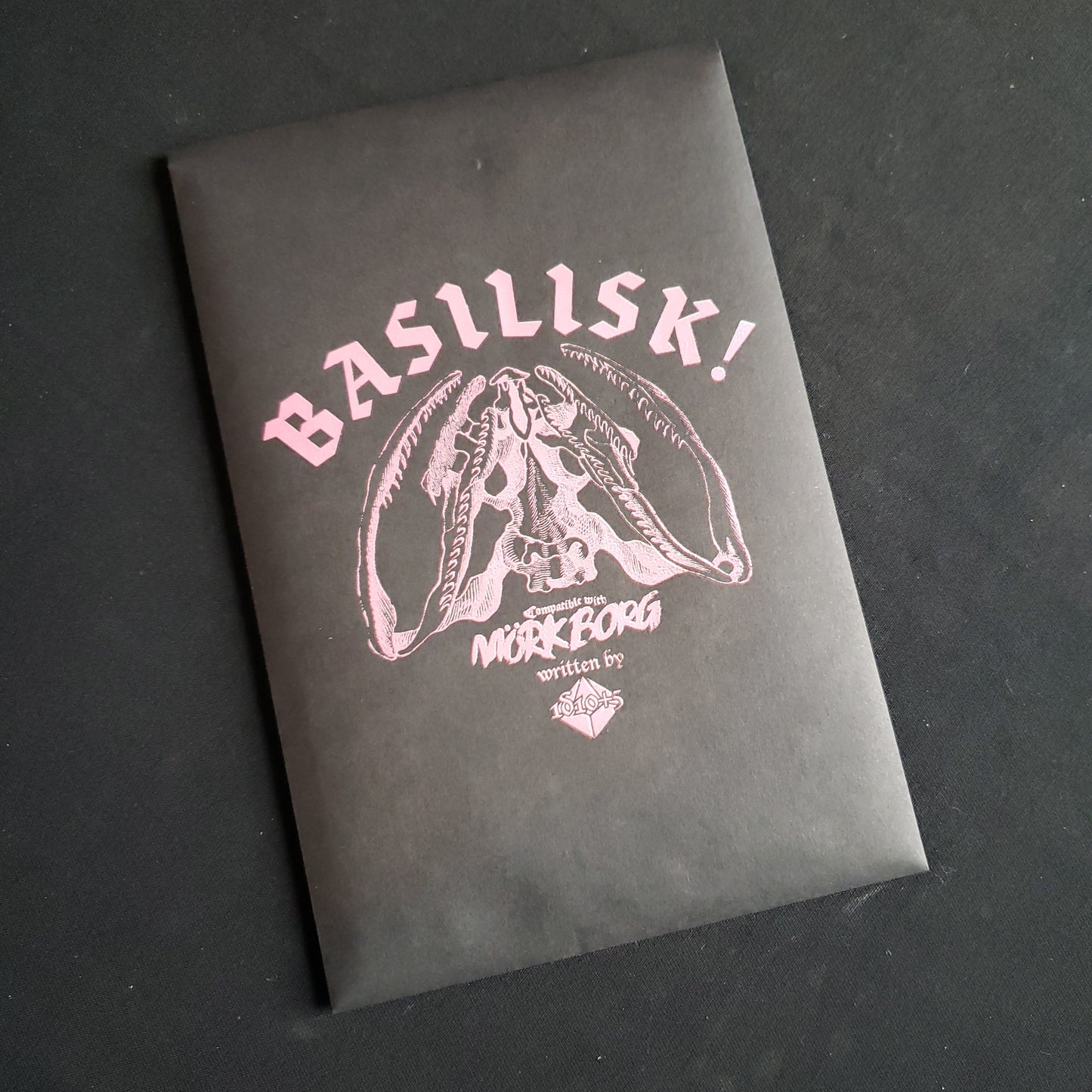 Image shows the front of the package for the Basilisk! roleplaying game
